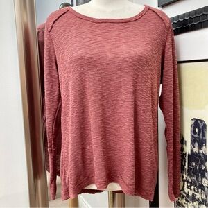 New burgundy waffle knit top with exposed seems.